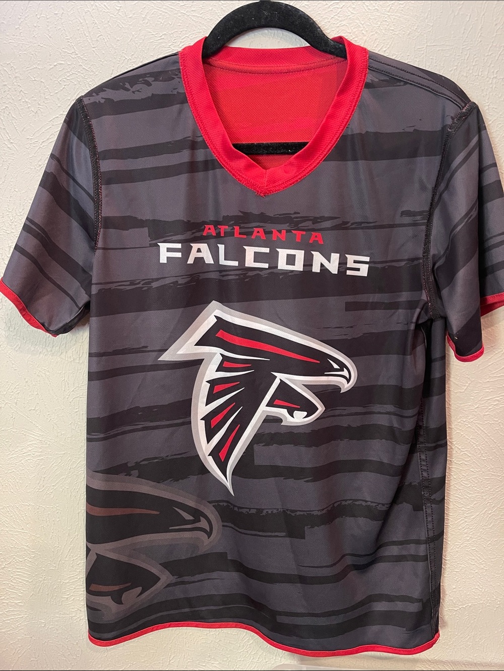 Atlanta Falcons Kids Gray & Red Short Sleeve flag football shirt. Size large.